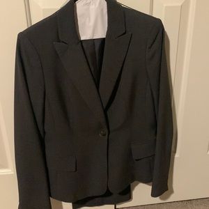 Beautiful dark gray Calvin Klein Suit Size 2 Great Condition